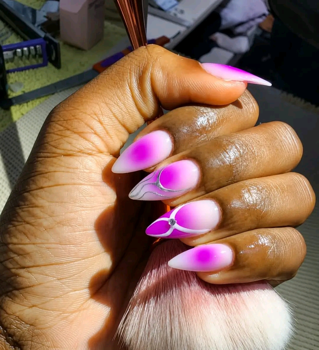 Mbewe's nails Logo