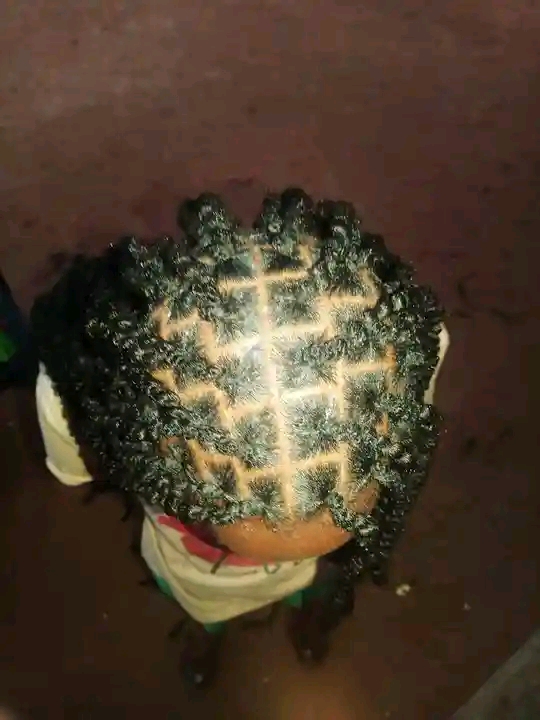 Mwaka's Hair Saloon Logo
